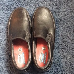 Women’s black Skechers work shoes